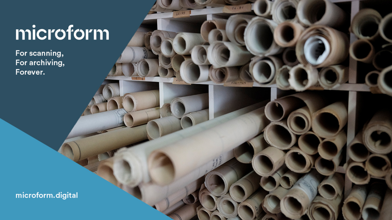 Microform Branding - Large maps rolled up in storage.